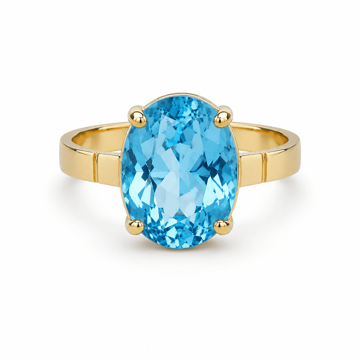 9ct Yellow Gold 16x12mm Oval Sky Blue Topaz Ring - Aurum Jewels