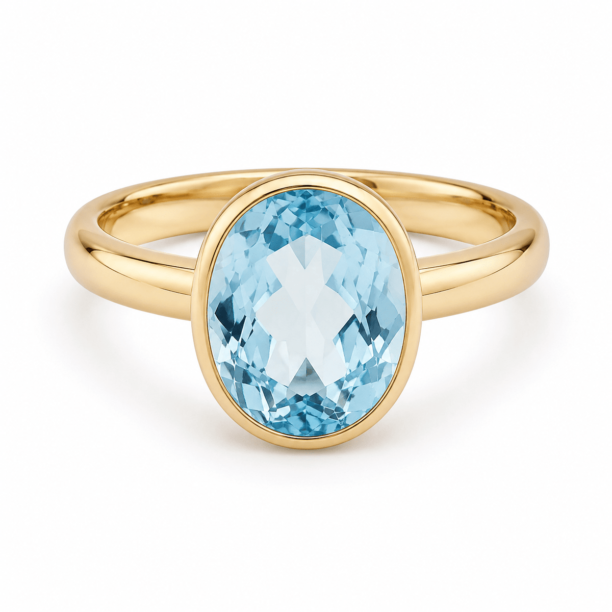 9ct Yellow Gold Bezel Set Oval Sky Blue Topaz - Aurum Jewels