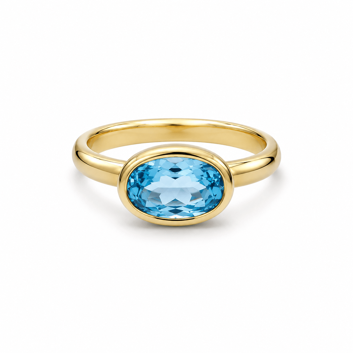 9ct Yellow Gold East/West Set Oval Sky Blue Topaz Ring - Aurum Jewels
