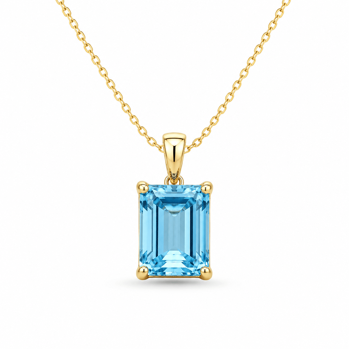 9ct Yellow Gold Emerald Cut Swiss Blue Topaz Pendant - Aurum Jewels